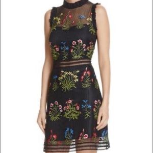 Black mesh dress with floral embroidery Size M